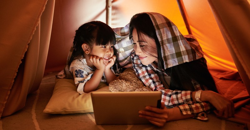 Mom and daughter watching a movie on a tablet, Faith-based movies free on Amazon Prime