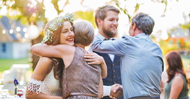 Parents with adult children at wedding