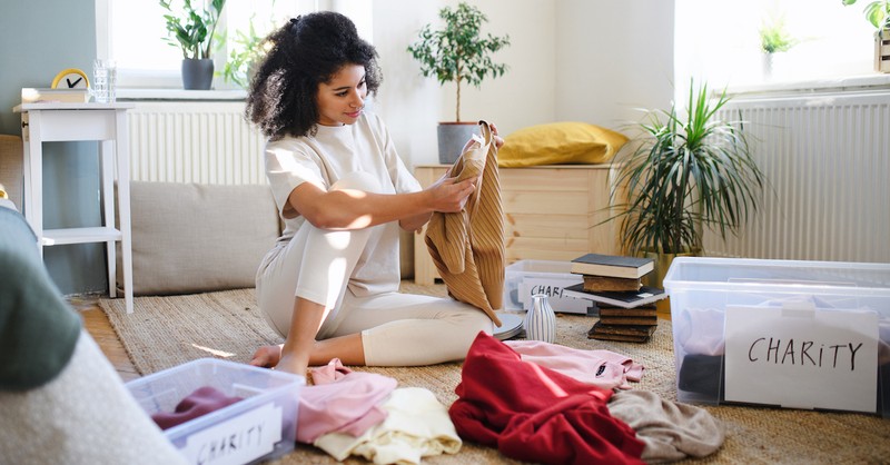 Woman cleaning and organizing home