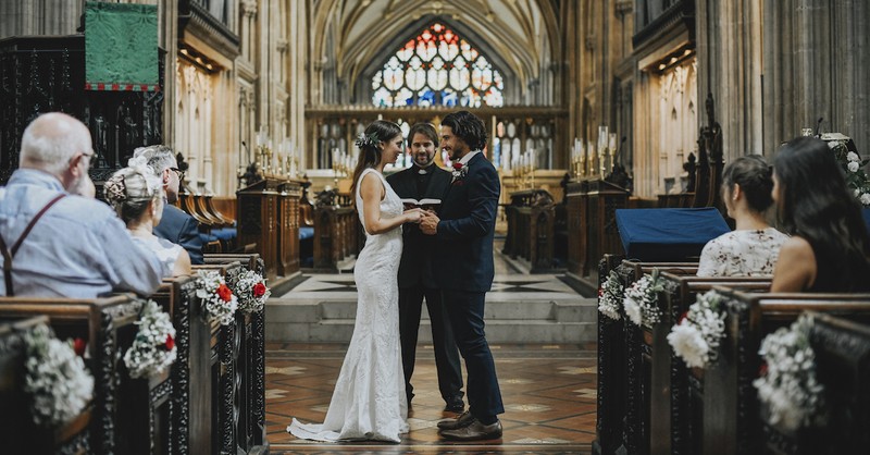 Couple standing at the altar during a wedding ceremony